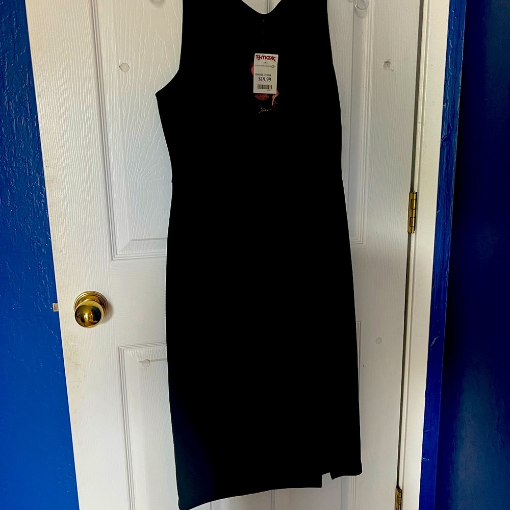 LBD. Black Tank Dress with ribbed texture and slit on thigh.